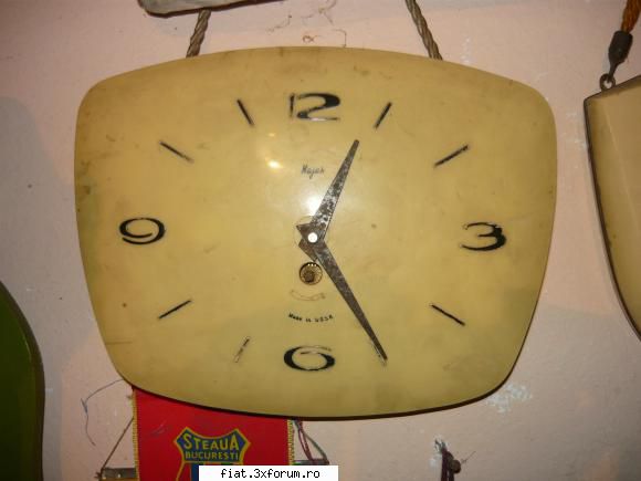 radio incorporat ,fier calcat carbuni din bronz etc ceas mayak perete lei