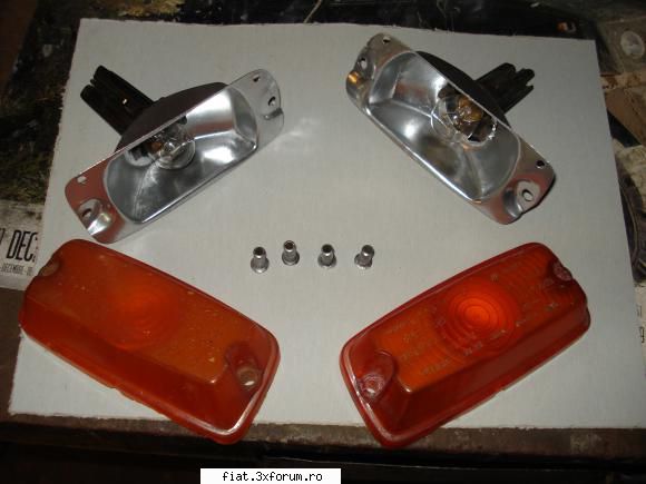 ansamblul inainte de montaj, cu capsele  laterale de pe aripi ptr  fiat 850