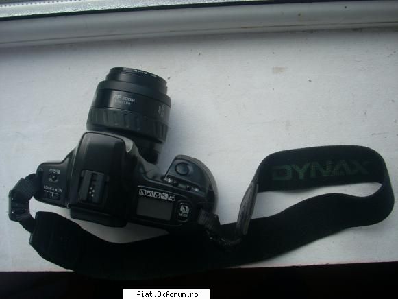 de vanzare un aparat de cu film normal, marca minolta este practic nou, a fost cumparat de nou si a