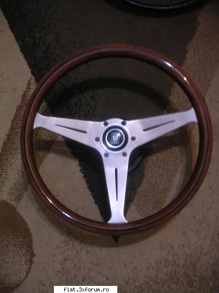 nardi torino, lemn si am volane de fiat 600, de fiat 126, fiat 500, dar sunt in beci... nu am poze