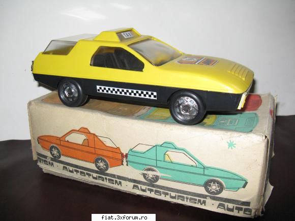 taxi amt, fabricat de agatex romania, motor cu frictiune, conditie pret 140 lei. jucarii tabla sau