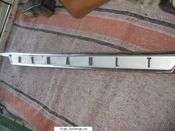 Vand pentru Dacia 1300 piese rare - ornament spate Renault lei starea se vede in poze - Anunturi