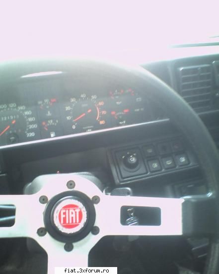 fiat ritmo - uite o poza si cu butonul pt oglinzi electrice - Masina mea...